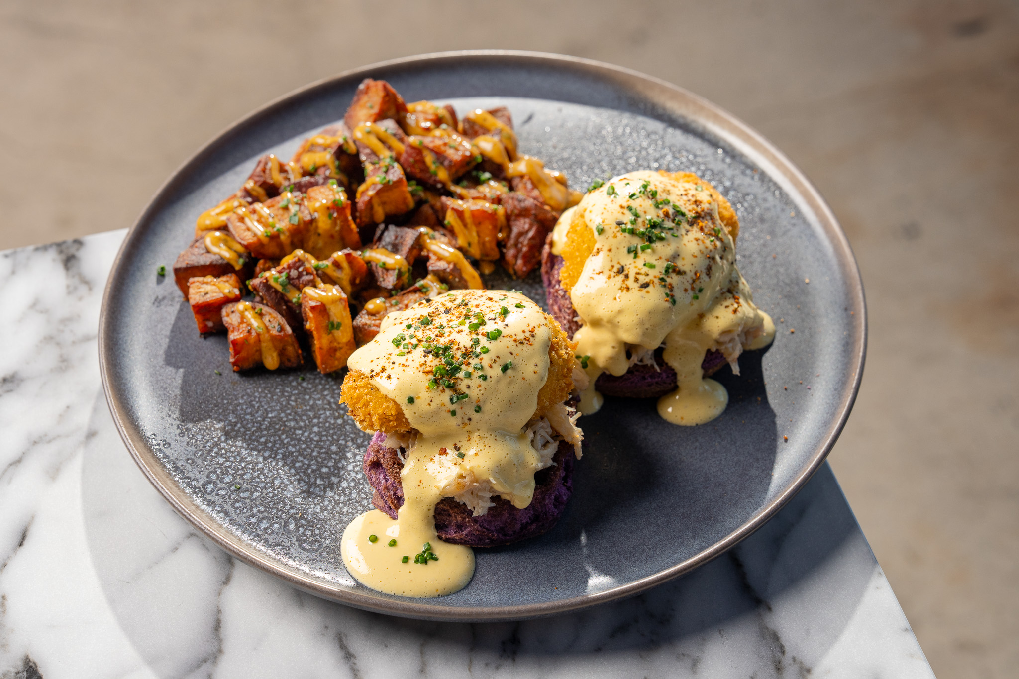 Rock Crab Benedict at Cherryfish, ube pandesal with calamansi hollandaise