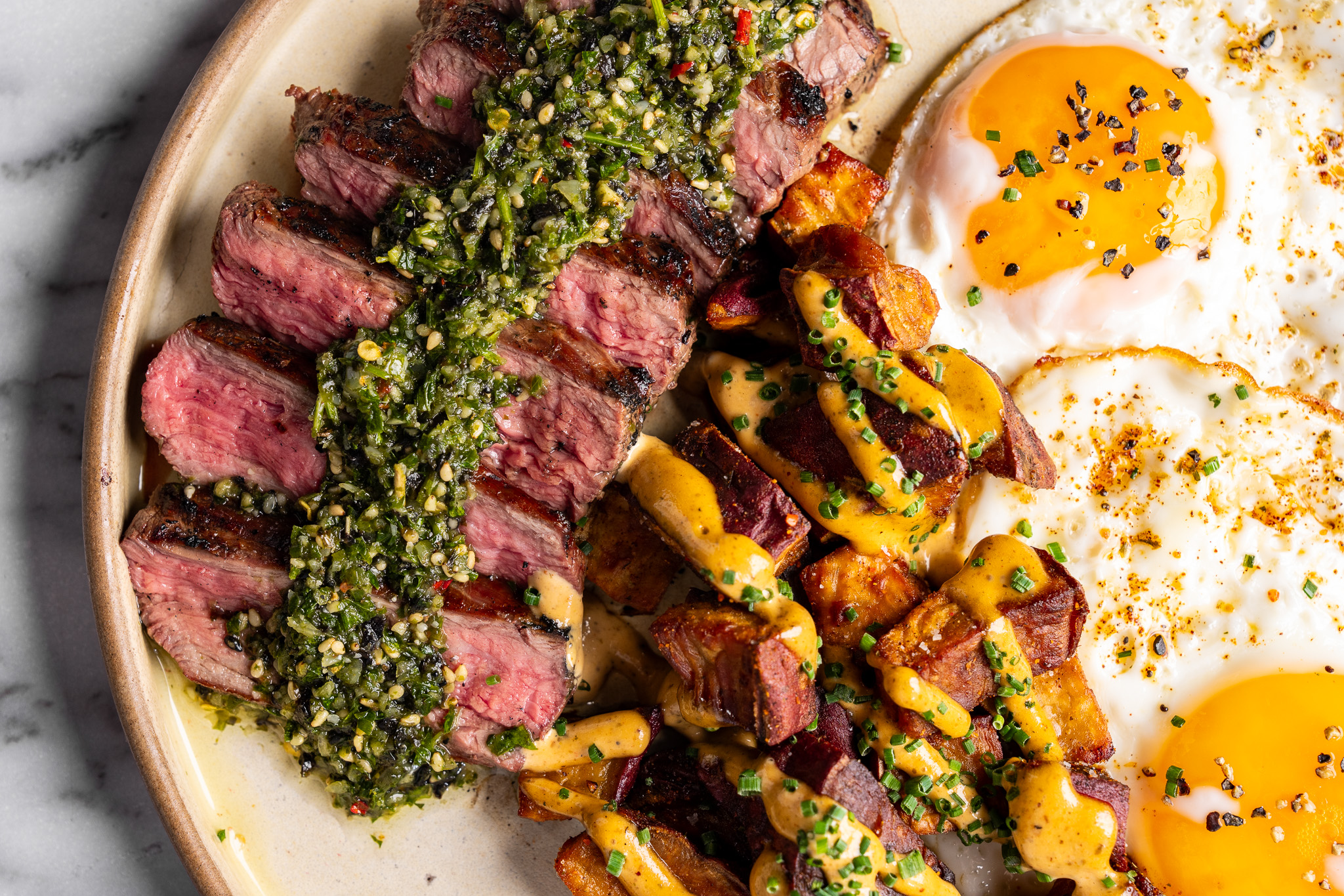 Steak and Eggs at Cherryfish, charcoal grilled hanger steak with nori chimichurri